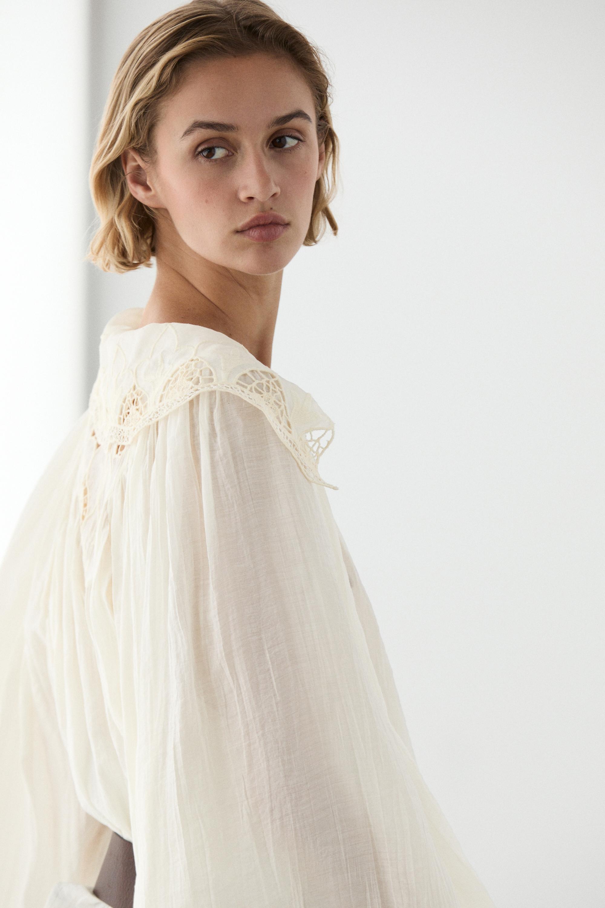 Embroidered flowing blouse